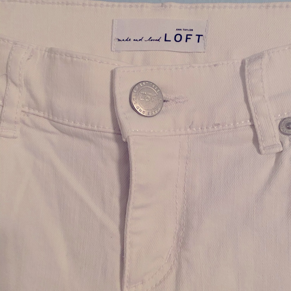 White Ann Taylor skinny jeans.